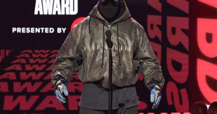 Kanye West Flexes Diamond Flip-Flops During London Fashion Week