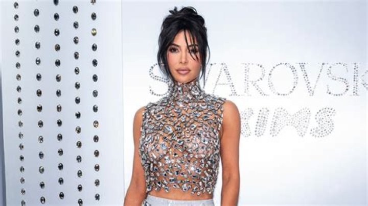 Kim Kardashian Wears Sheer Bejeweled Top and Crystal Skirt for Swarovski Store Opening [Photos]