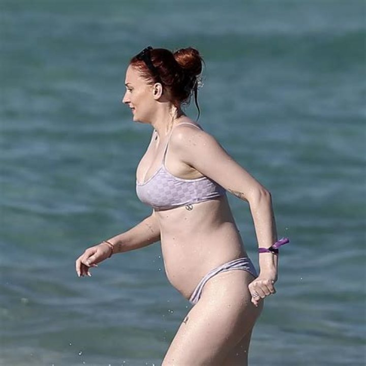 Sophie Turner Shows Off Her Curves in Black Swimsuit During Miami Trip With Fiancé Joe Jonas