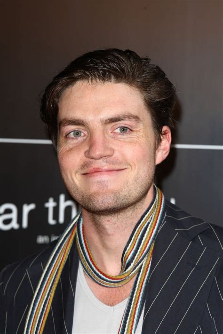 How tall is Tom Burke